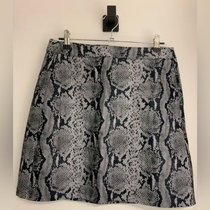 Joe Fresh snake skin print faux leather skirt. Size 6. Tags on still.